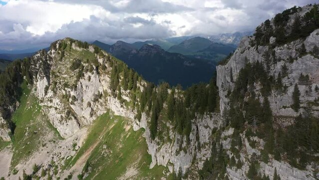 Cinematic light shinning on cliffs in the French Alps