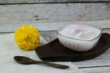 Sarim, a soft and beautiful Thai dessert with sweet and fragrant coconut syrup.