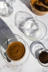 Coffee with ice. Dalgona coffee. Creamy coffee with ice and almond milk. Ideal drink for summer