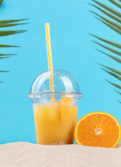 orange juice on the beach