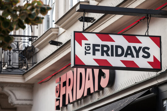 PRAGUE, CZECHIA - NOVEMBER 1, 2019: TGI Fridays logo in front of their restaurant for Prague. TGI Fridays is an American multinational chain of casual dining restaurants