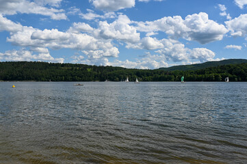 View of the lake Eder with sailing boats and blue sky