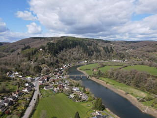 Tintern is a village in the community of Wye Valley, on the west bank of the River Wye in Monmouthshire, Wales, close to the border with England, about 5 miles north of Chepstow