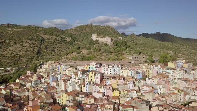 Aerial drone shot of Castello Malaspina castle at top of a mountain In Bosa
