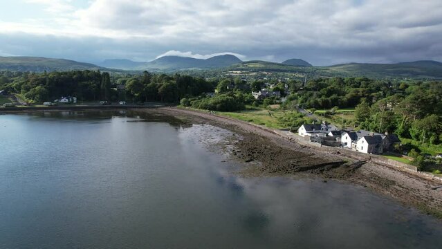 Cottages on edge of Kenmare bay County Kerry Ireland drone aerial view
