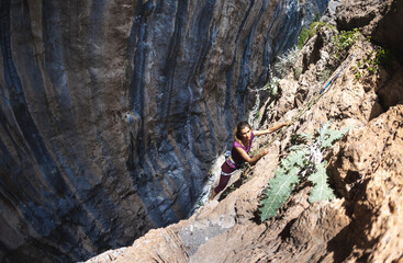 female rock climber