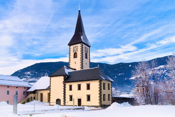 Fototapeta na wymiar Ossiach Abbey, a former Benedictine monastery on the southern shore of Lake Ossiach in Carinthia, Austria