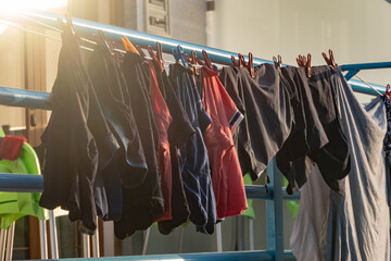 Ksamil, Albania, Male underwear hangs to dry on a line.