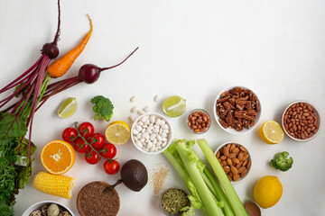Food white background with vegetables and beans vegan concept top view