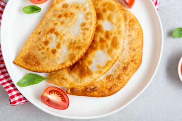 Cheburek pastry on plate food top view