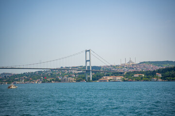 The Bosphorus Bridge and boats in Istanbul, Turkey