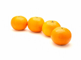 Top view of fresh oranges over a white background