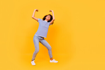 Fototapeta na wymiar Full body portrait of hardworking person look arms palms hold resist up empty space isolated on yellow color background