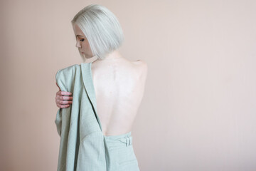 Portrait of a beautiful young woman in a coat.