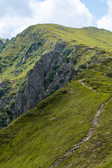 Fototapeta na wymiar Landscape with mountains and clouds. Rocks. Hiking tourist destination