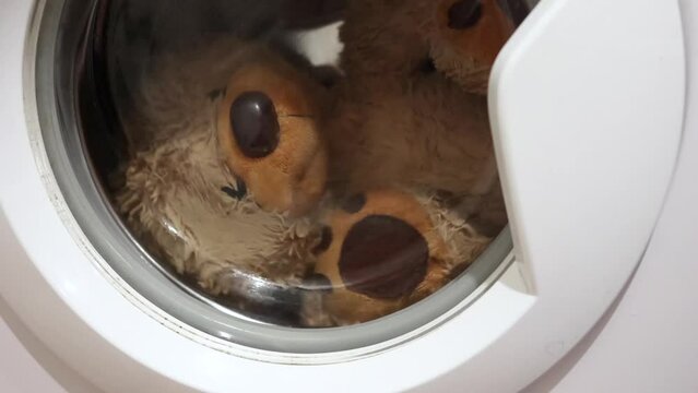 Soft toy brown bear is washable in the washing machine