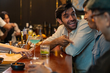Group of Handsome man enjoy and fun hangout nightlife meeting drinking cocktail alcoholic drink...