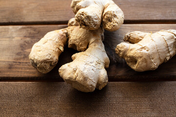Ginger root on wooden table