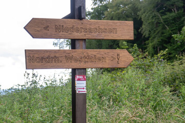 wooden direction sign