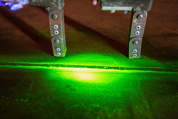 Steel plate tank butt weld carbon background green contrast of magnetic field fluorescence