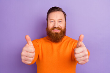 Photo of handsome guy in vivid color sweater show thumb-up cheer you up say good job isolated on purple color background