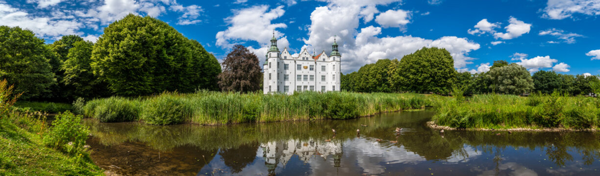 Ahrensburg, Germany - July 5, 2022: The Ahrensburg Castle (German: Schloss Ahrensburg) on a sunny summer day.