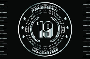 19th silver anniversary logo with ring. Silver anniversary laurel wreath.