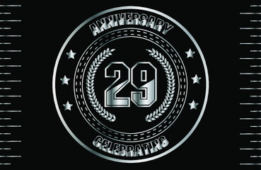 29th silver anniversary logo with ring. Silver anniversary laurel wreath.