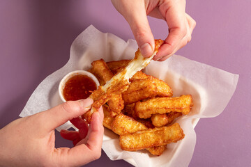 Appetizing gold fried halloumi portion with sweet chilli dip