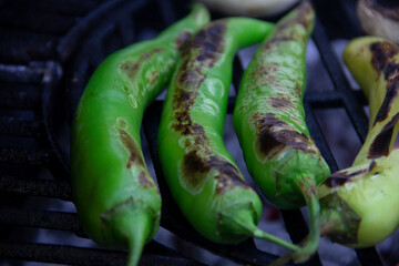delicious green pepper cooked on fire
