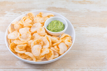 Fried shrimp cracker in thai style. Shrimp cracker with avocado dip