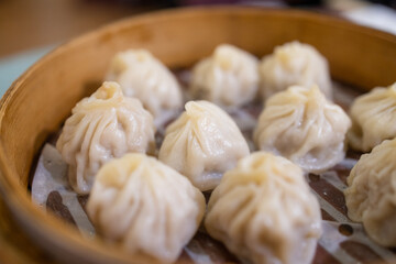 Taiwan cuisine steamed soup bun in basket