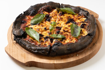 black pizza on a white background