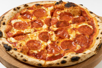 italian pizza with salami on a white background