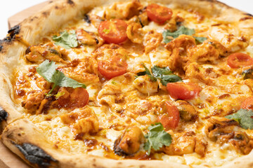 tom yam pizza on a white background