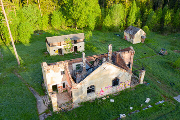 Aerial view of ruins of a Finnish farm on sunny morning. South Ladoga, Leningrad Oblast, Russia.