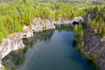 Fototapeta na wymiar view of Grand Marble Canyon of Ruskeala mountain park on sunny summer day. Karelia, Russia.