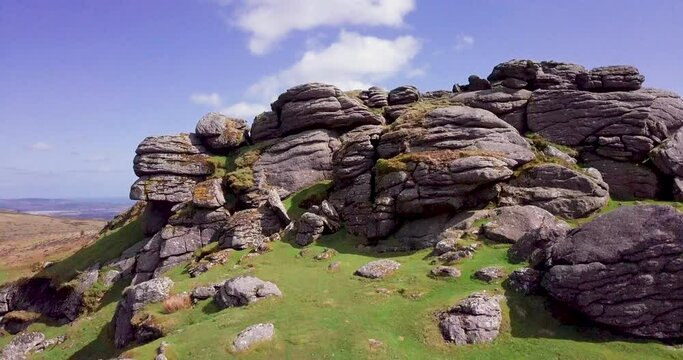 Dartmoor National Park rocky landscape with moorland and countryside reveal