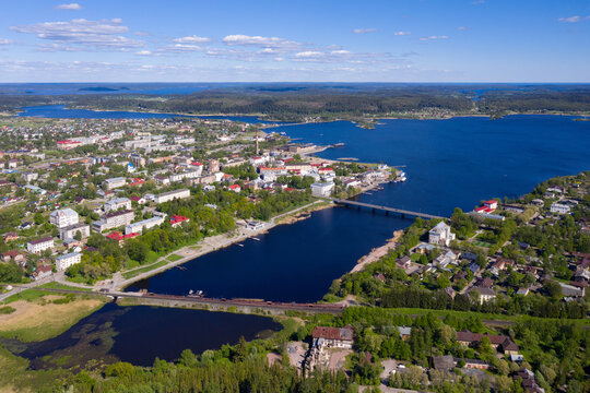 Drone view of Sortavala and bridges over Lyappyarvi lake on sunny summer day. Karelia, Russia.