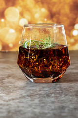 Cocktail liqueur with festive joy on the bokeh background