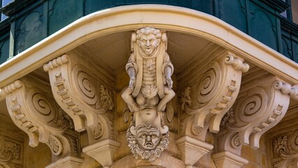 Decorative Corbel holding a corner balcony of the Grandmaster's Palace Valletta © Godwin Borg/Wirestock Creators