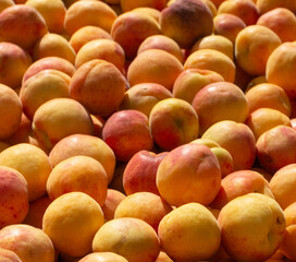 Close up of fresh ripe apricots, selective focus, background
