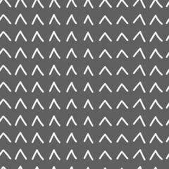 Vector. Grey and white background. Artistic background, hand drawn simple shapes, checkmarks. Mosaic abstract background. Repeating geometric texture.