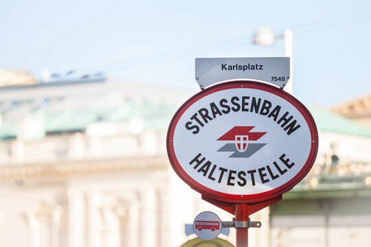 VIENNA, AUSTRIA - NOVEMBER 6, 2019: Logo of Wiener Linien on a local tram stop (Strassenbahn Haltestelle) on Karlsplatz in Vienna. Wiener Linien is the public transportation authority in Vienna
