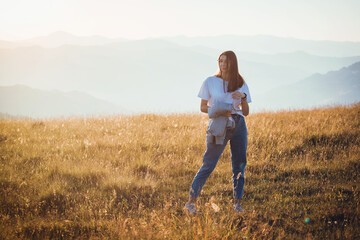 Naklejka na ściany i meble Cute Teen Girl in Golden Mountain Sunrise Landscape 