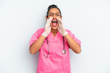 hispanic  woman feeling happy,giving a big shout out with hands next to mouth. nurse concept