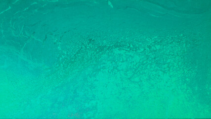 Sea surface of Sardinia, Italy. The color of the water is crystalline turquoise. Holiday concept.