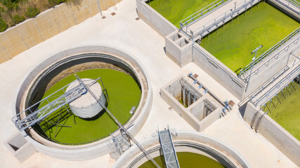 Aerial view of the tanks of a sewage and water treatment plant enabling the discharge and re-use of...
