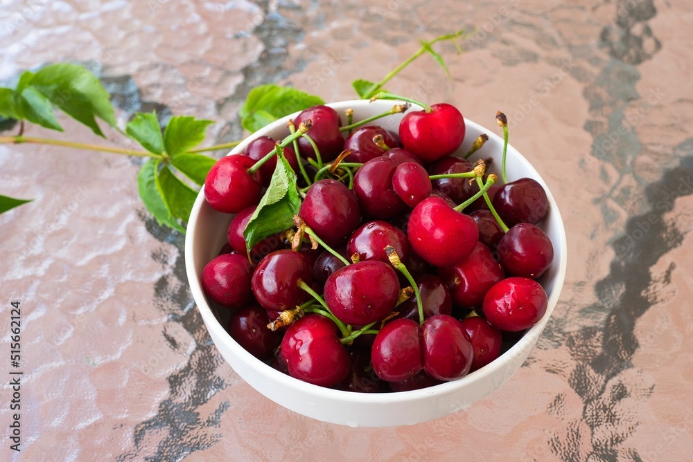 Canvas Prints Delicious red cherries, summer fruits, in a basket, on a wooden table