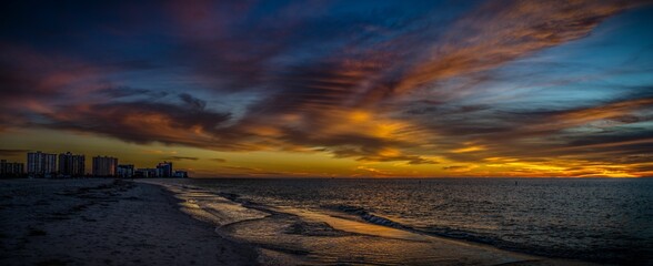 Panoramic view of dramatic sunset sky over Clearwater coast, Tampa Bay, Florida, USA